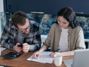 Woman-Signing-Documents-revocable-living-trusts